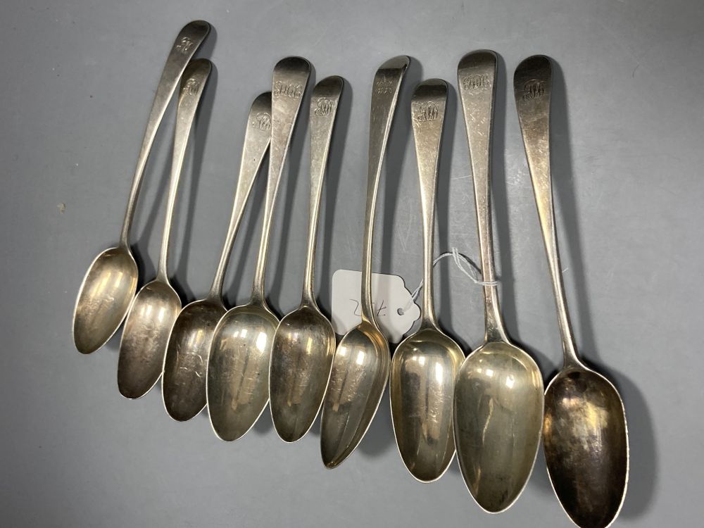 Eight assorted late 18th century silver Old English pattern tablespoons and an early 19th century silver spoon,